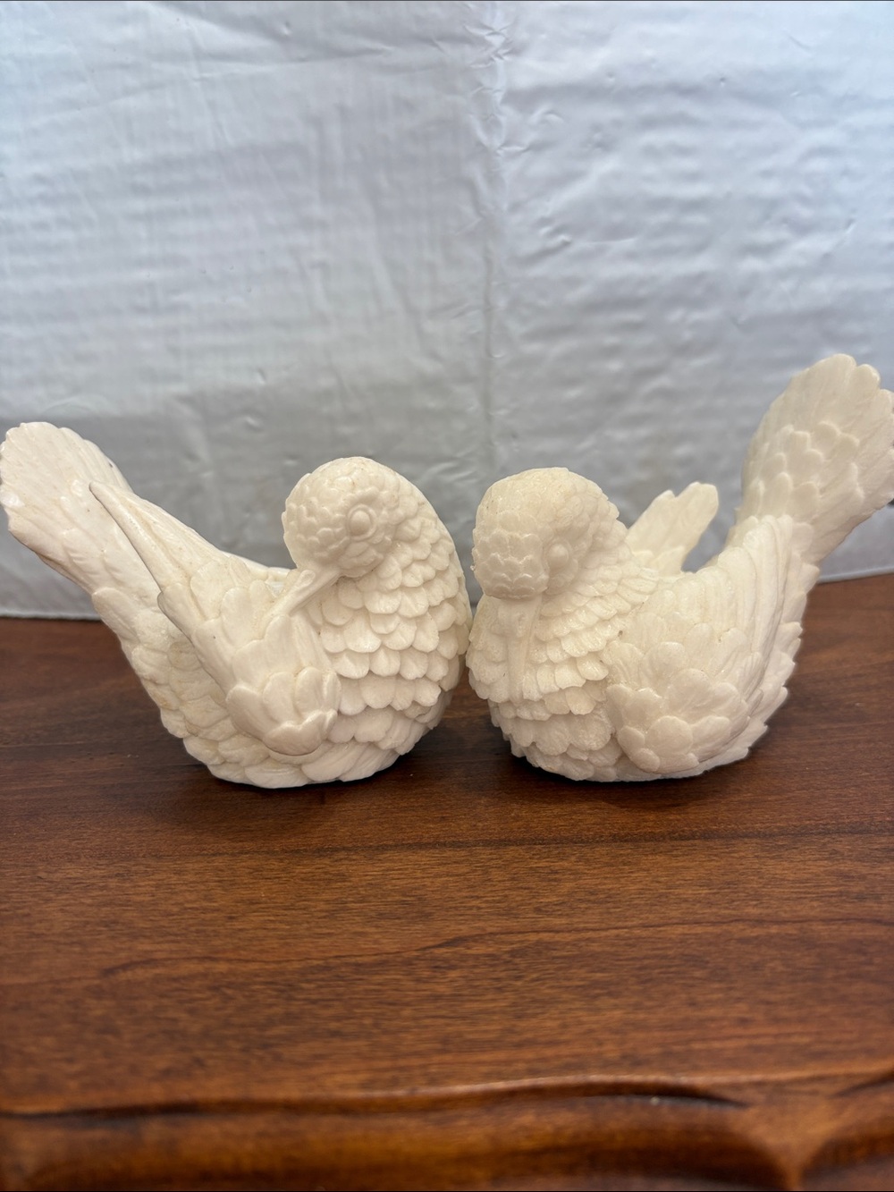 Vintage white carved alabaster dove figurines.